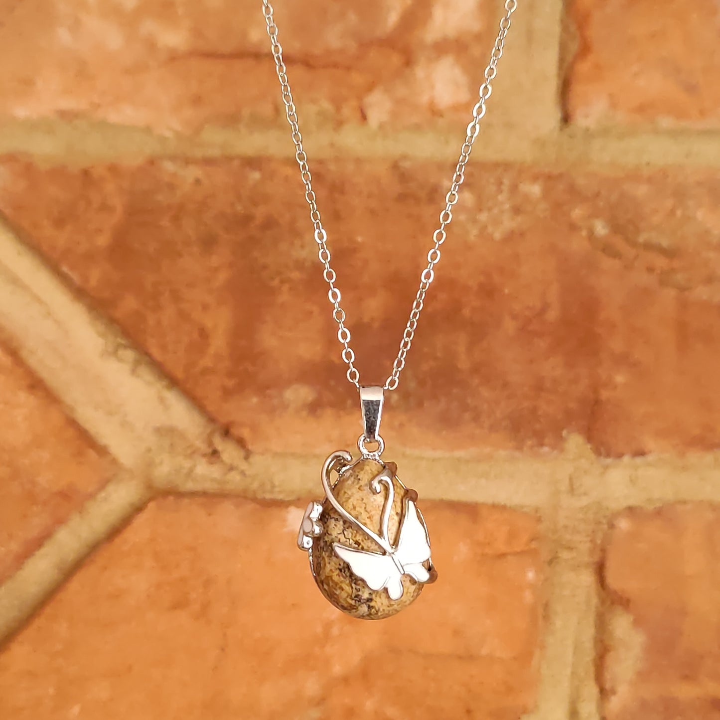 Rain Drop Shaped Crystal Pendants with Butterfly Mounted base Natural Stone Crystal Chakra Positive Energy